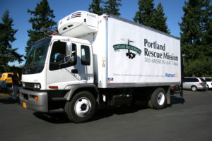 Refrigerated truck provided by the Walmart Foundation helps transport food to our various ministry sites.